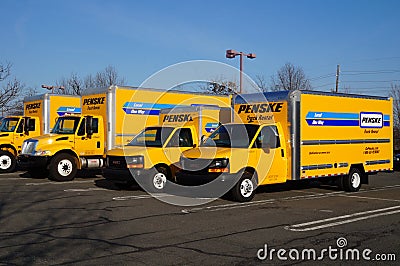 A fleet of yellow Penske rental trucks Editorial Stock Photo