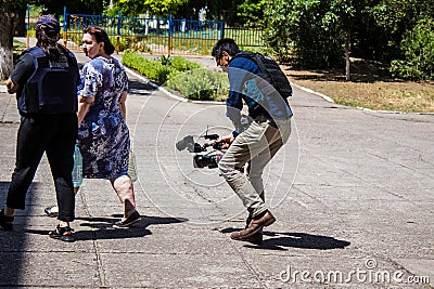 Fletcher Yeung, Camera Operators for ABC News at Nikopol, Ukraine - July 10, 2023 Editorial Stock Photo
