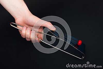 Flexatone, fleximetal struck idiophone - modern percussion musical instrument Stock Photo