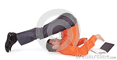 Flexible businessman with laptop Stock Photo