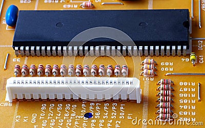 Flexible flat cable connector, microchip and other components mounted on printed circuit board Stock Photo