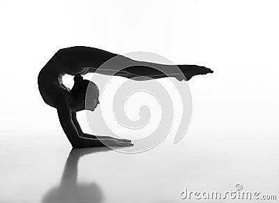 Flexible girl makes a beautiful pose b&w Stock Photo