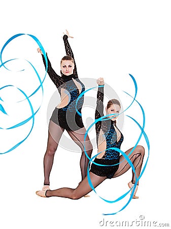 Flexible gymnasts dancing with blue ribbons Stock Photo