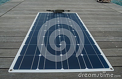 Flexible polycrystalline solar panel for yachts on the berth deck Stock Photo