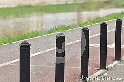 Flexible traffic bollard for bike lane. Stock Photo