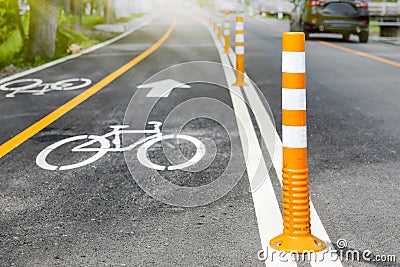 Flexible traffic bollard for bike lane. Stock Photo