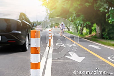 Flexible traffic bollard for bike lane. Stock Photo