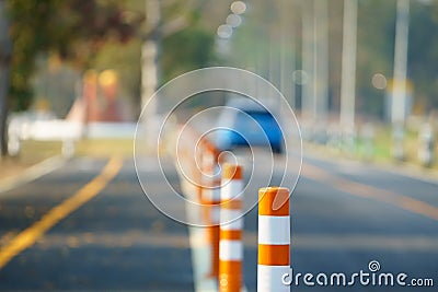 Flexible traffic bollard for bike lane. Stock Photo