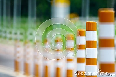 Flexible traffic bollard for bike lane. Stock Photo