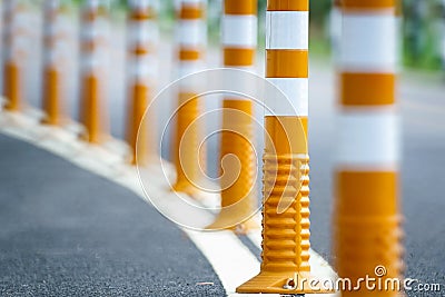 Flexible traffic bollard for bike lane. Stock Photo