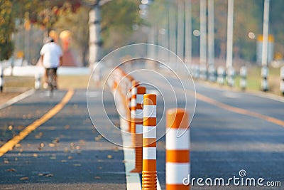 Flexible traffic bollard for bike lane. Stock Photo