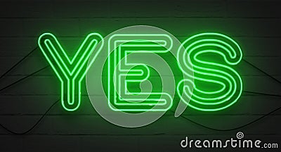 Flickering blinking green neon sign on brick wall background, yes affirmative sign Stock Photo