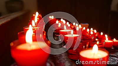 Red Votive Candles in a Church Stock Photo