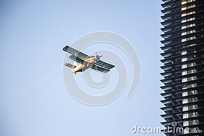 Flight of an agricultural plane Stock Photo