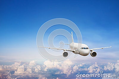 Flight, airplane flying in blue sky, travel background Stock Photo