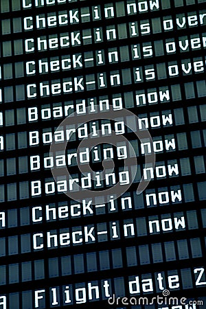 Flight arrival board in airport, closeup. Stock Photo