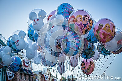 A flight of balloons hovering over Main Street USA, Disneyland Editorial Stock Photo