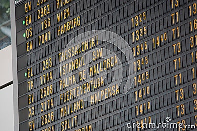 Flight board on the airport - great for topics like traveling, aviation etc. Stock Photo