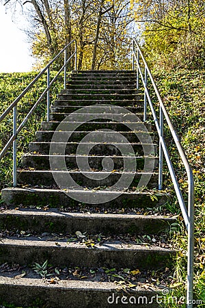 Flight of concrete steps leading up an embankment Stock Photo