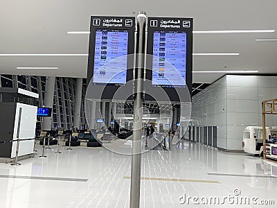Flight Departures information board Bahrain Airport waiting room, schedule on electronic scoreboard, concept passenger traffic, Editorial Stock Photo