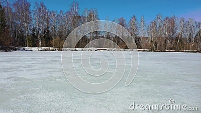 Flight over a frozen pond stock footage Flight over a frozen pond stock footage
