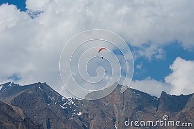 Flights on paraplanes in mountains Stock Photo