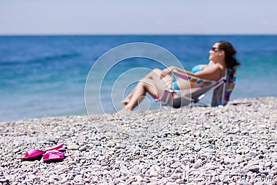 Flip-flop on the beach Stock Photo