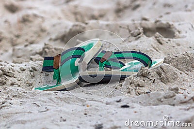 Flip flops left on the beach Stock Photo