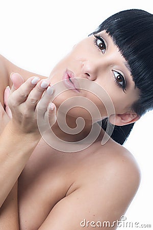 Flirtatious Romantic Beautiful Young Woman Blowing a Kiss Stock Photo