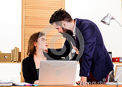 Flirting with coworker. Woman flirting with guy coworker. Woman attractive lady with man colleague. Office collective Stock Photo