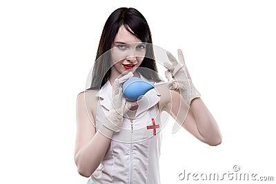 Flirting nurse with enema and hint Editorial Stock Photo