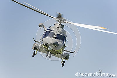 Fliyng helicopter Stock Photo