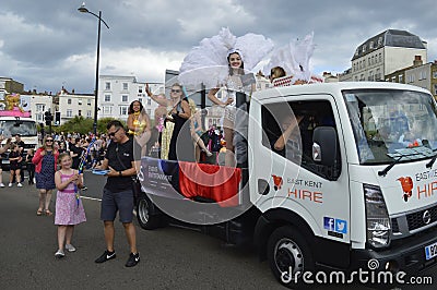 A float and costumed performers in the Margate Carnival Parade. Editorial Stock Photo