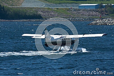 Float plane in water in Alaska Stock Photo