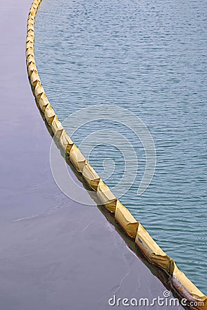 Floating anti-pollution barrier made with modular plastic elemen Stock Photo