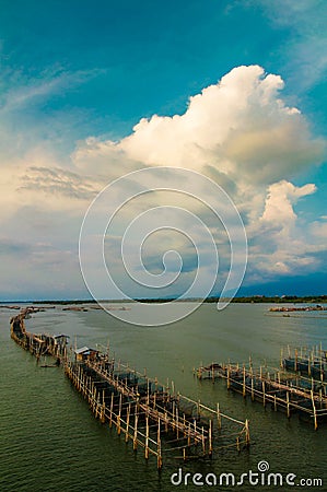 Floating basket and enormous clouds. Stock Photo