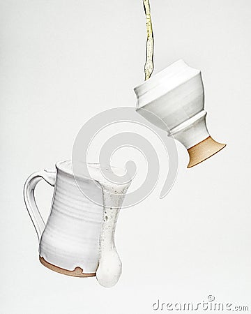 Floating Ceramic Beer Mugs with Beer Stock Photo