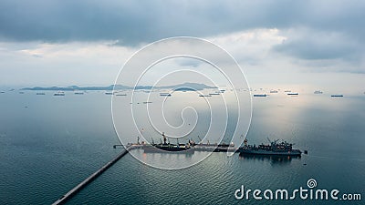Floating drilling platform on the ocean at evening in rainy season aerial view Stock Photo