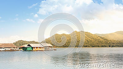 Floating house on the water with nature background at Chiangmai Stock Photo