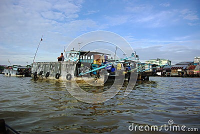 Floating market in the Mekong Delta Editorial Stock Photo