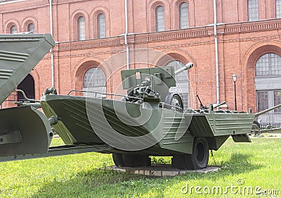 A floating military trailer with a gun. Editorial Stock Photo