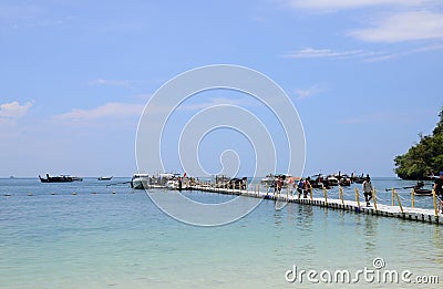 Floating piers along shore place for tourists walk. Mooring boat plastic pontoon that floats in sea water at Hong island Editorial Stock Photo
