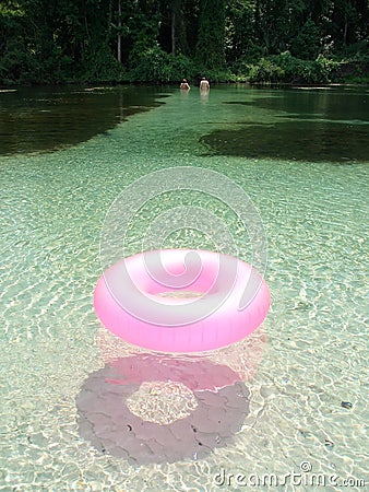 Floating pink rubber ring Stock Photo