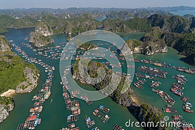 Floating Village on Ha Long Bay, Cat Ba Island, Vietnam, descending dragon bay Asia Aerial Drone Photo Stock Photo