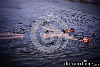 Floating weightless on the water Stock Photo