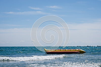 Floating yellow banana boat ride . Stock Photo