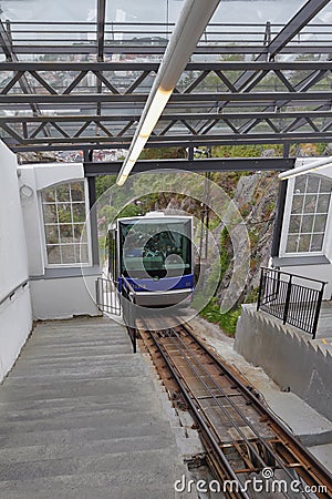 Bergen, Norway - Jun 13, 2012: Floibanen funicular car arrives at station Editorial Stock Photo