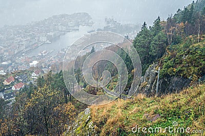 The Floibanen funicular tracks in the rain Stock Photo