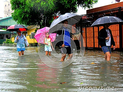 Flood caused by typhoon Mario (international name Fung Wong) in the Philippines on September 19, 2014 Editorial Stock Photo