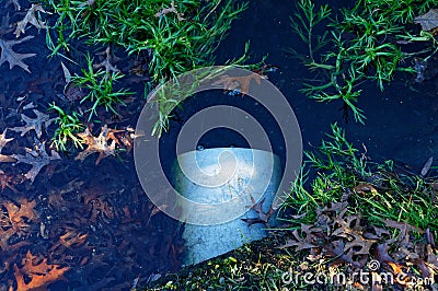 Flood overflow pipe from pond Stock Photo